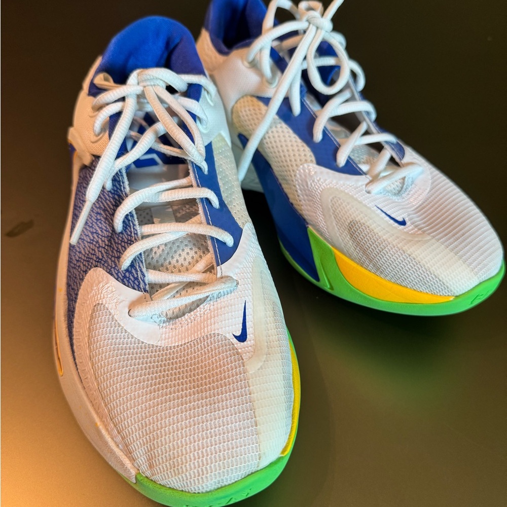 Nike Kids' White and Blue Sneakers with Green and Yellow Accents